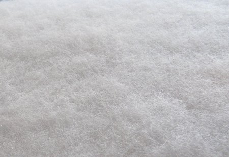 Termoisolamento con insufflaggio di fiocchi di lana di vetro